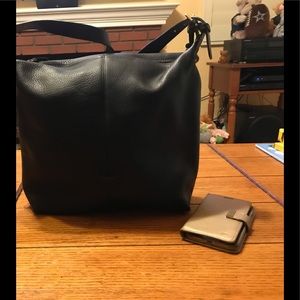 Dooney & Bourke all leather black hobo. Like new